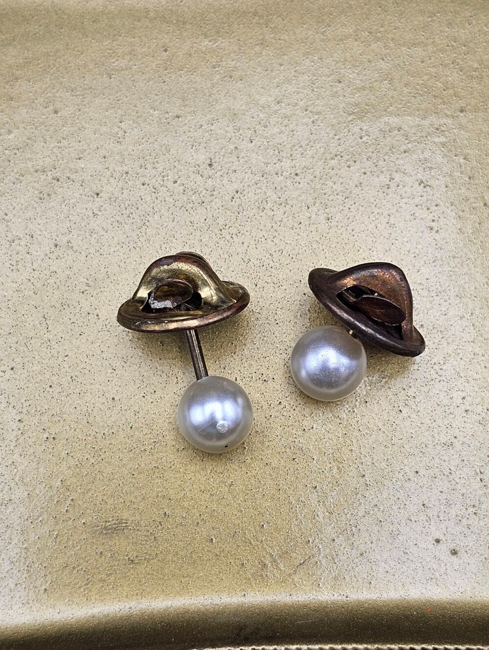 Hat and pearl stud earrings